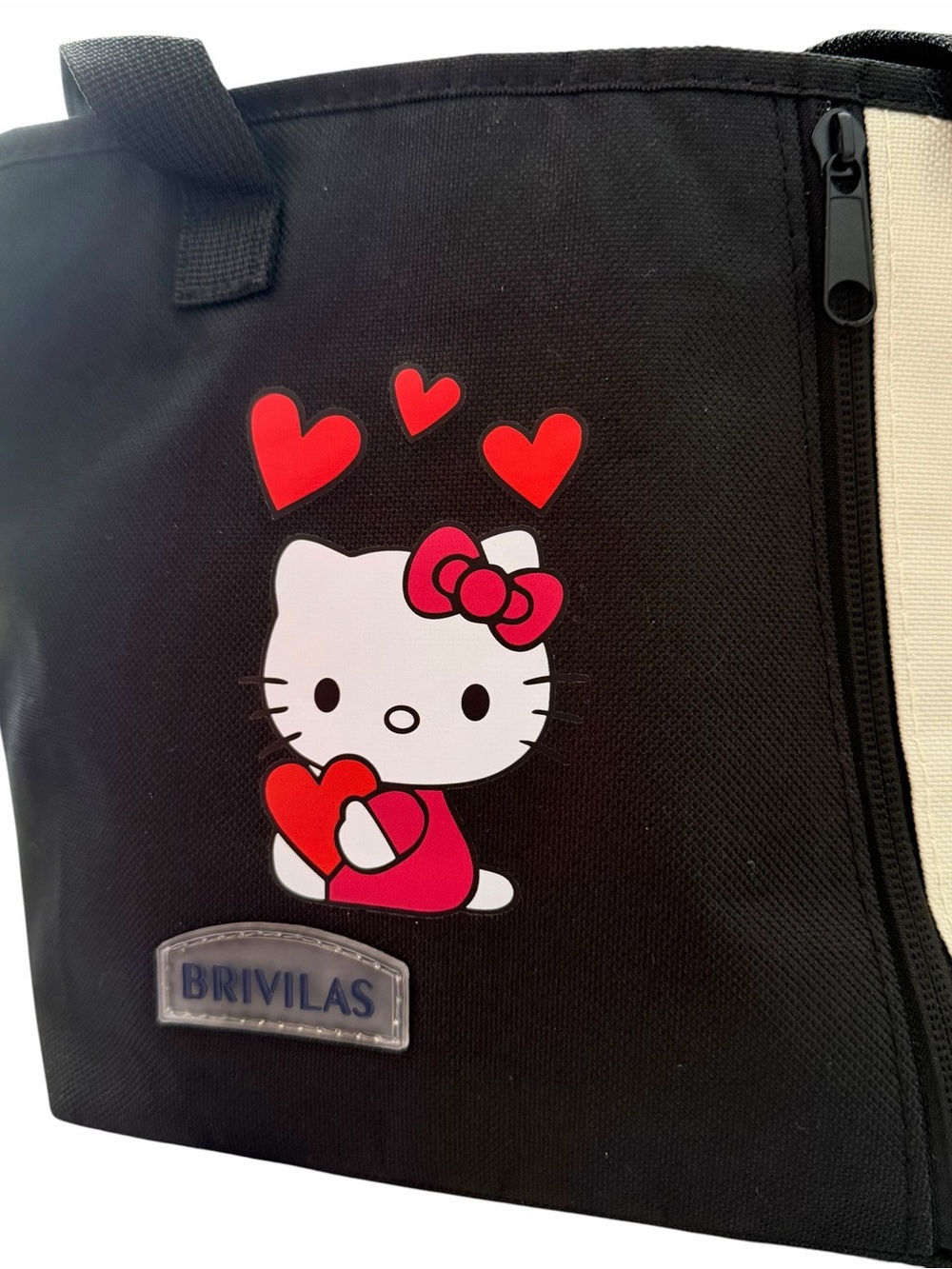 Hello Kitty Black Insulated Lunch Bag filled with Hello Kitty Goodies
